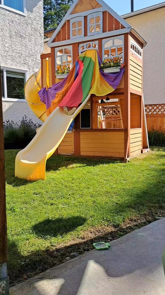 Outdoor play area with slide at Fav's Kangaroos daycare